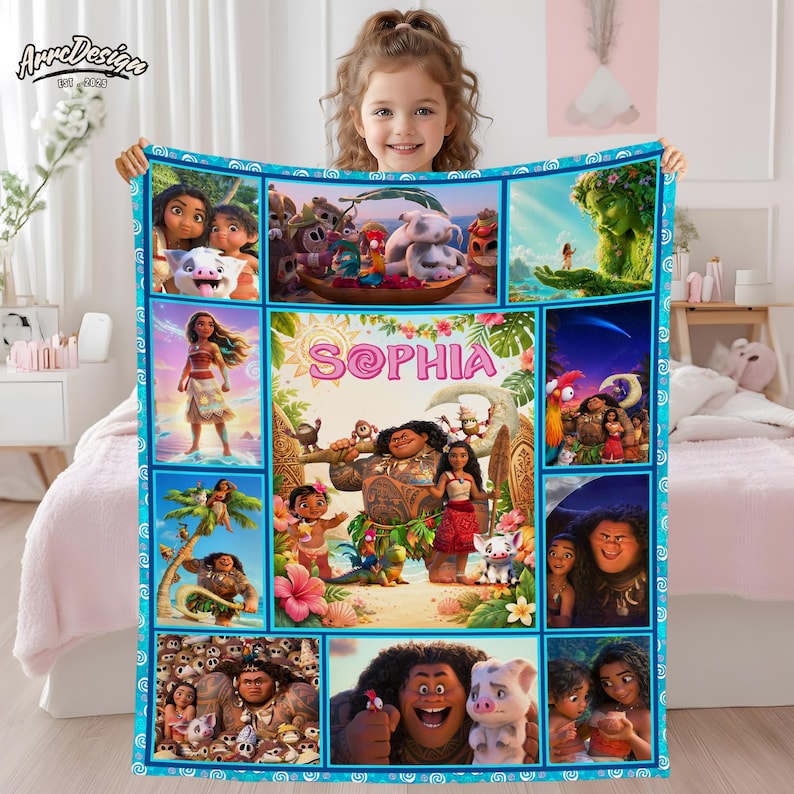 May include: A personalized fleece blanket featuring scenes and characters from the animated movie Moana. The blanket has a blue border and includes the name "Sophia" in pink letters. The blanket is a collage of colorful images from the film.
