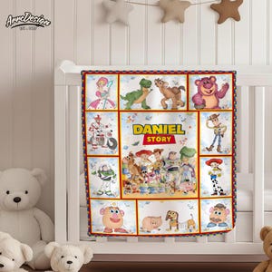 May include: A personalized baby blanket featuring characters from the animated film "Toy Story." The blanket has a patchwork design with various character illustrations and the name "DANIEL STORY" in the center. The blanket is displayed on a white crib.