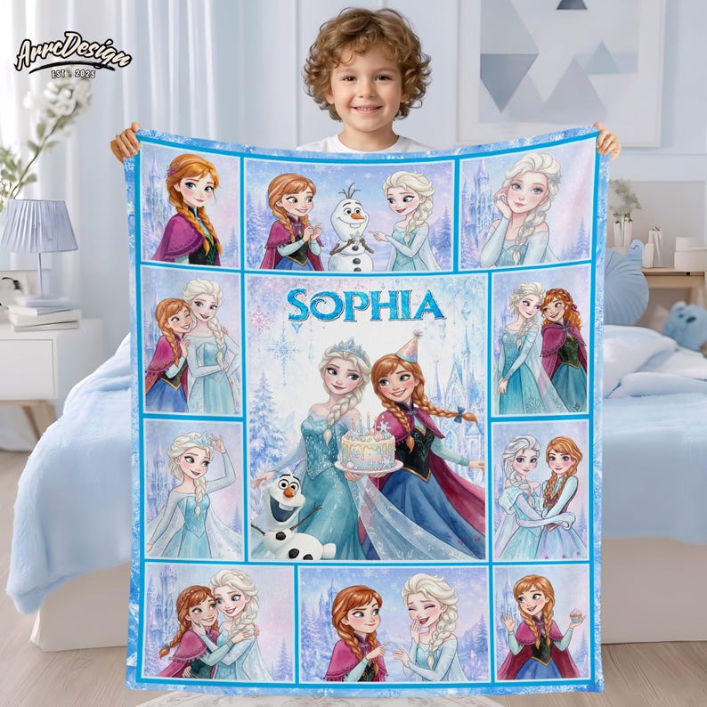 May include: A rectangular fleece blanket featuring a collage of Frozen characters including Elsa, Anna, and Olaf. The center panel displays the name Sophia in blue text above Elsa and Anna holding a cake. The design uses a light blue color palette.