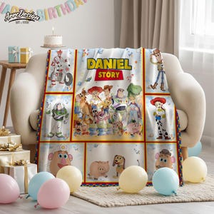 May include: A white blanket featuring a colorful design with characters from the movie "Toy Story". The blanket has the name "DANIEL" and the word "STORY" printed on it. The blanket is decorated with images of Buzz Lightyear, Woody, and other characters.