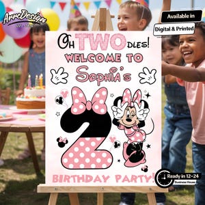 May include: A pink and white birthday party sign featuring Minnie Mouse and the text "Oh Twodles! Welcome to Sophia's Birthday Party!" The number 2 is pink with white polka dots. The sign is on an easel.