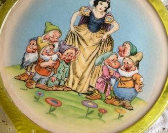 Espejo de mano vintage de Blancanieves y los siete enanitos, plástico amarillo.