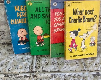 Juego de 4 libros de bolsillo antiguos de Charlie Brown, de Charles M. Schulz y Fawcett Crest.