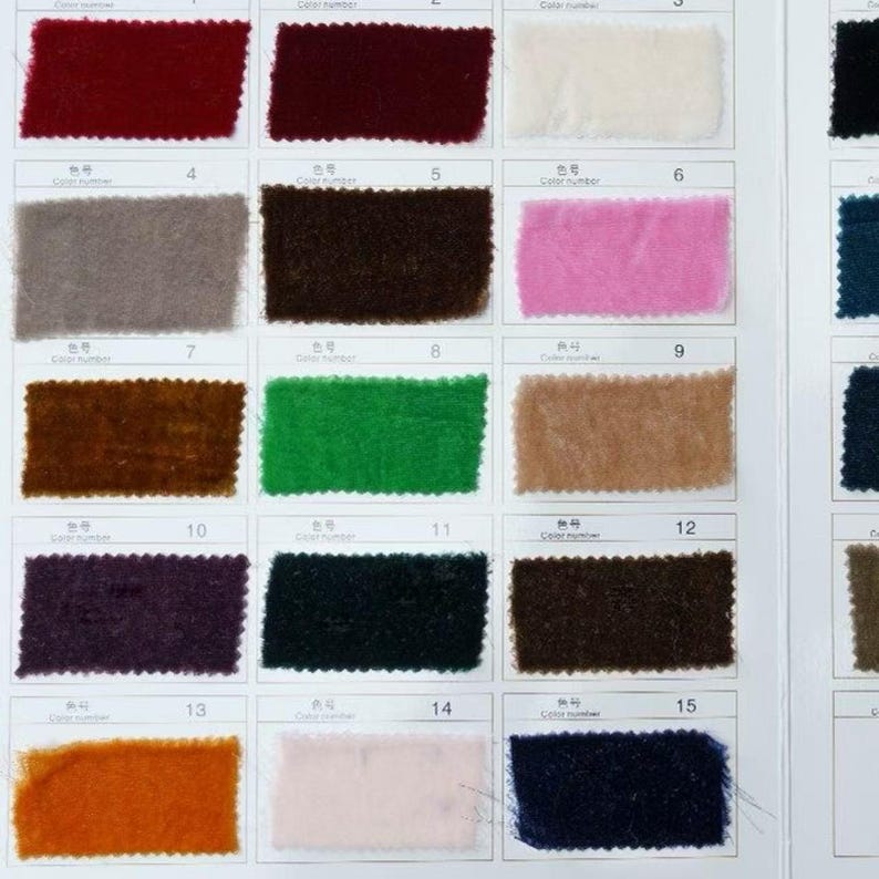 May include: A fabric colour chart displaying fifteen rectangular swatches in a range of hues. The swatches include shades of red, brown, pink, green, and blue. Each sample is numbered and has a colour code.