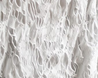 Algodão texturizado pesado branco com efeito desgastado - Tecido artesanal para camisetas e moletons.