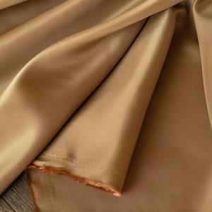 Fodertyg i polyesterviskos, antistatisk slät Bemberg-ersättning, kan beställas på metervara Copper khaki