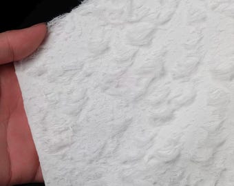 Tissu jersey blanc double épaisseur : jersey texturé doux pour hauts et manteaux de créateurs