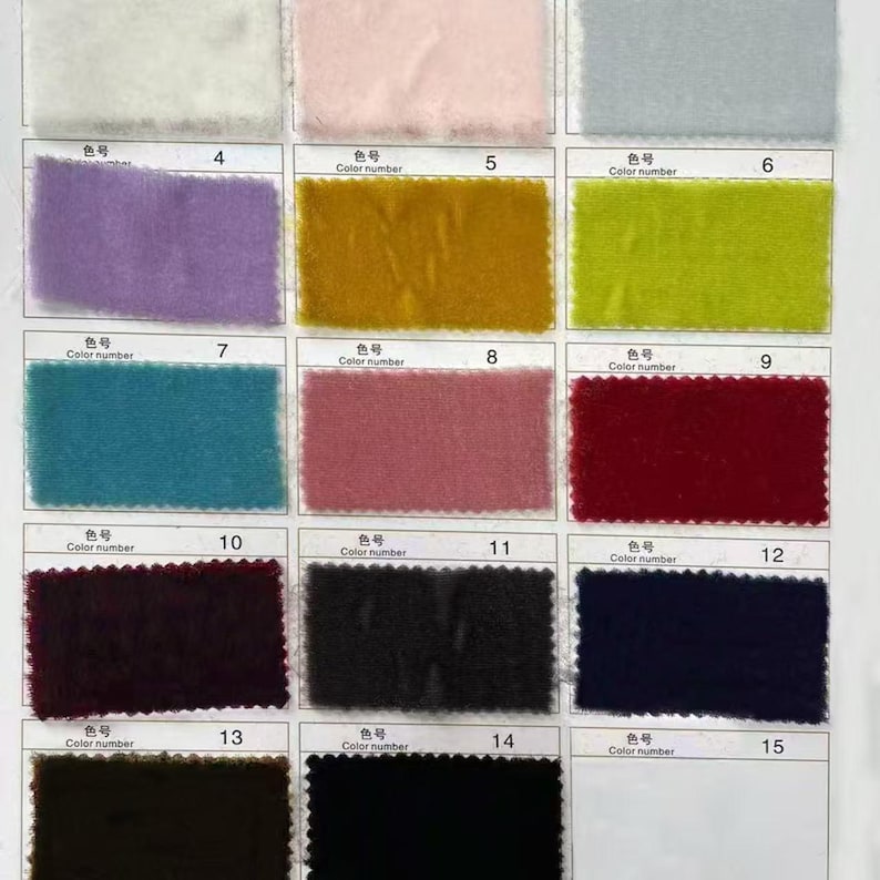May include: A color chart featuring rectangular fabric swatches in various colors. The swatches are numbered and labeled with "Color number" in English. Colors include purple, gold, green, teal, pink, red, dark burgundy, black, and navy.