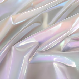 May include: A close-up of iridescent fabric with a pearlescent sheen. The fabric is draped and folded, creating soft shadows and highlights. The colors shift from white to pink, blue, and green, giving it a shimmering effect. The material appears smooth and reflective.