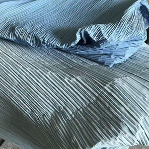 May include: A rustic wooden sign with the text "Welcome to our home" in white lettering. The sign has a distressed finish and a simple, inviting design, ideal for entryway decor.