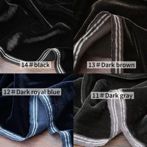 May include: Close-up of four swatches of velvet fabric in various colors: black, dark brown, dark royal blue, and dark gray. Each swatch has a contrasting stripe detail with the color name and number printed on the fabric.
