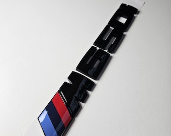 Emblema estilo 650i en negro brillante para modelos BMW Serie 6 (E24, E63, E64, F12, F06, F13, G32). Adhesivo para rotulación de vehículos.