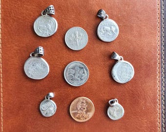 1. Colgante de moneda griega antigua: auténtico tesoro de plata de 2000 años de antigüedad