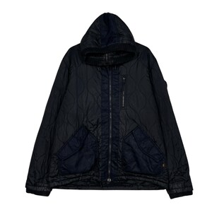 May include: Black quilted jacket with a hood and a full-length zipper. The jacket features two front pockets and a small chest pocket. The design includes navy blue accents on the zipper panel and pockets. The jacket has a diamond pattern.