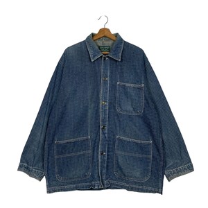 May include: A blue denim jacket with a grid pattern, long sleeves, and four front pockets. The jacket has a button-up closure and a collared neckline. The garment is hanging on a wooden hanger.