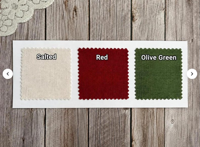 May include: Three square fabric swatches with pinked edges arranged horizontally on a white rectangular card. The swatches are labeled Salted, which is a light beige, Red, and Olive Green. Each swatch displays a distinct solid color.