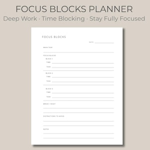 May include: A white Focus Blocks Planner with the text "FOCUS BLOCKS PLANNER" at the top. The planner includes sections for time blocking, tasks, and notes. The text "Deep Work • Time Blocking • Stay Fully Focused" is also present.