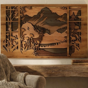 May include: Wooden wall art depicting a mountain landscape scene. The artwork is made of layered wood, creating a 3D effect. The color palette includes shades of brown and tan. The artwork is displayed above a wooden console table.