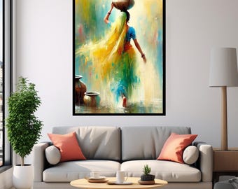 May include: An abstract painting depicts a woman in a colorful sari carrying a pot on her head. The artwork features a vibrant palette of yellow, blue, and green hues, with a blurred, impressionistic style. The painting is framed in black and hangs above a gray sofa.