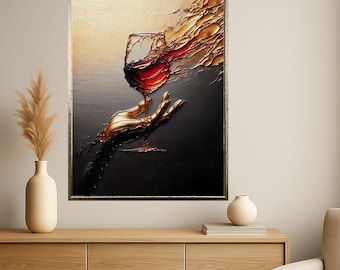May include: Abstract art print featuring a wine glass filled with red liquid, held by a golden hand. The background transitions from black to beige, with textured gold accents. The artwork is framed in a metallic silver.