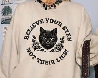 Abolish ICE Sweatshirt, Anti Trump Crewneck, Believe Your Eyes Not Their Lies Shirt, Political Activist Gift, Social Justice Cat Sweater