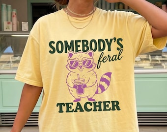 Somebodys Feral Teacher Comfort Colors® Shirt, Funny Raccoon Teacher Graphic Tee, Trendy Teacher Life Shirt, Back To School Teacher T-Shirt