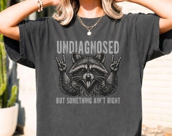 Funny Raccoon Shirt, Comfort Colors Undiagnosed But Something Aint Right Tee, Unhinged Graphic Top Chaotic Energy Apparel