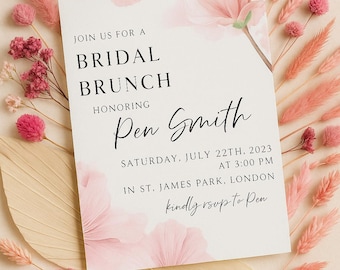 May include: A bridal brunch invitation with floral accents. The invitation features the text "JOIN US FOR A BRIDAL BRUNCH HONORING Pen Smith" and event details. The design includes pink flowers and decorative dried plants.