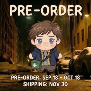 May include: A cartoon-style chibi character with brown hair, wearing a blue jacket over a yellow plaid shirt, and a green cross-body bag with a white plus sign. Text reads: PRE-ORDER, PRE-ORDER: SEP 18 - OCT 18, SHIPPING: NOV 30.