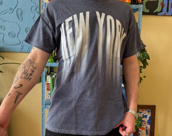 Vintage River Island New York Grafik T-Shirt Blau Faded Style T-Shirt Größe M / L