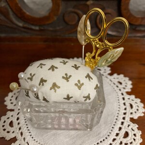 White with Green Leaves Pin Cushion in a Clear Rectangular Vintage Salt Cellar