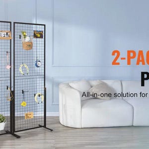 May include: Two black gridwall panel displays with various items attached, including small decor and accessories. The panels stand in front of a white couch. Text on the image reads "2-PACK GRIDWALL PANEL PANELS" and "All-in-one solution for storage, say goodbye to clutter."