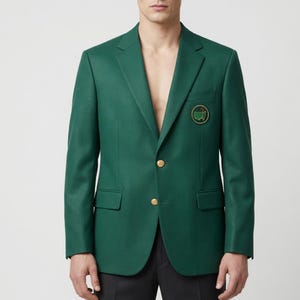 May include: A dark green blazer with gold buttons and a small emblem on the chest. The blazer has a classic design with two front pockets and a notched lapel. The jacket is a solid color and appears to be made of a smooth fabric.