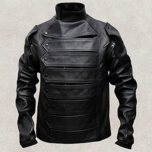 May include: Black leather jacket with a high collar and multiple horizontal panels across the chest. The jacket has a unique design with button and zip details, and a tailored fit. The sleeves are long and fitted.