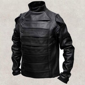 May include: Black leather jacket with a high collar and multiple horizontal panels across the chest. The jacket features button and zipper details, with a tailored fit and long sleeves. A stylish outerwear piece.