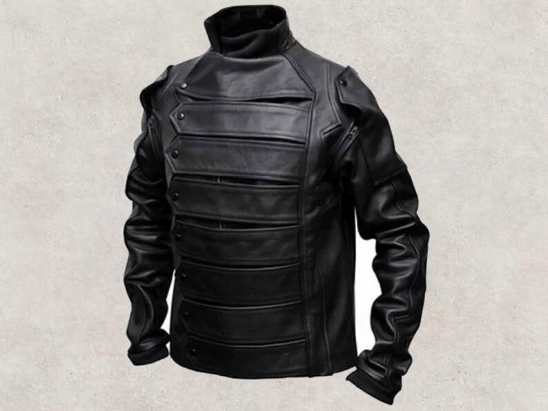 May include: Black leather jacket with a high collar and multiple horizontal panels across the chest. The jacket features button and zipper details, with a tailored fit and long sleeves. A stylish outerwear piece.