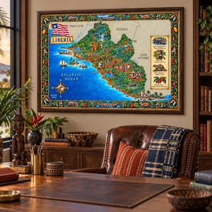 May include: A framed, colorful illustrated map of Liberia featuring the national flag, the Atlantic Ocean, and various wildlife and cultural scenes. The map includes text labels for Liberia, Sierra Leone, Guinea, and Cote d'Ivoire, with a decorative border.
