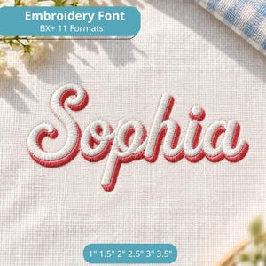 May include: The name Sophia is embroidered in a cursive script on a white fabric background. The lettering features a white center with a pink outline. Text at the top reads Embroidery Font BX+ 11 Formats, and text at the bottom reads 1" 1.5" 2" 2.5" 3" 3.5".