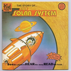May include: Vintage children's book cover titled "The Story of Our Solar System." The cover features an orange rocket ship with a child astronaut, a yellow planet with rings, and text that reads "See the pictures HEAR the story READ the book."