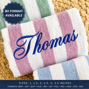 May include: A folded white towel with vertical mauve stripes featuring the embroidered name Thomas in blue script. The image includes text stating BX FORMAT AVAILABLE and lists sizes 1, 1.5, 2, 2.5, 3, 3.5 INCHES and formats BMP, DST, EXP, HUS, INF, JEF, PEC, PES, SEW, VP3, XXX.