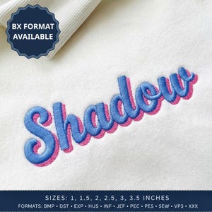 May include: An embroidery design featuring the word Shadow in blue script with a pink drop shadow on a white fabric background. A dark blue badge states BX FORMAT AVAILABLE. Text at the bottom lists sizes 1, 1.5, 2, 2.5, 3, 3.5 inches.