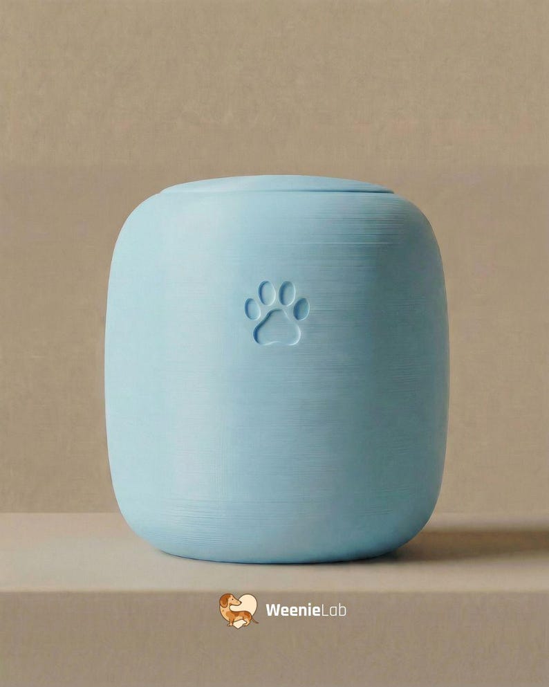 May include: A set of three ceramic mugs with a speckled, matte finish. The mugs are in shades of cream, light gray, and dark gray. Each mug has a simple, minimalist design, perfect for coffee or tea.