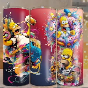 Op de afbeelding: Drie roestvrijstalen bekers met kleurrijke illustraties van Homer Simpson. Eén beker toont Homer met een biertje en donut, een andere met een donut en de derde met tatoeages. Elke beker heeft een rietje.