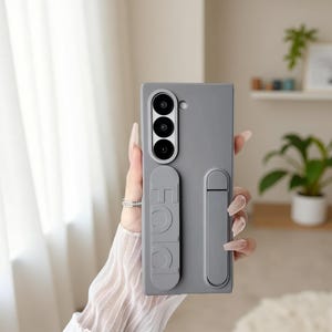 Wristband Foldable Stand Case for Samsung Galaxy Z Fold 7 6 5 4 3 – Slim PC + TPU Protective Cover with Kickstand Grip