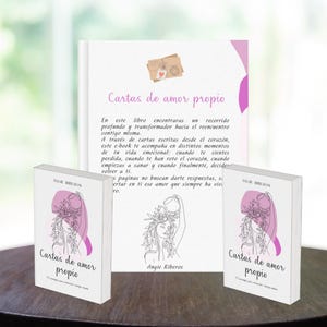 Puede incluir: Un conjunto de libros titulados "Cartas de amor propio" (Cartas de amor propio) con una ilustración de línea de una mujer y el nombre de la autora, Angie Riberos. Los libros son blancos con detalles en rosa. Un libro más grande con texto está en el fondo.