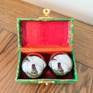 May include: A set of three ceramic mugs with a speckled, matte finish. Each mug features a different color: light blue, cream, and gray. The mugs have a simple, modern design with a rounded shape and a comfortable handle.