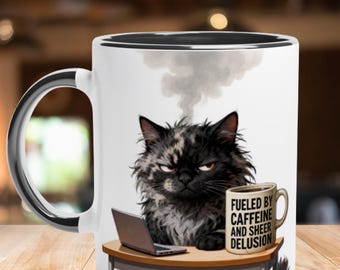 Funny Mug “Fueled by Caffeine and Sheer Delusion” – Sarcastic Cat Coffee Mug, Office Gift for Coworkers, Work From Home Humor Cup