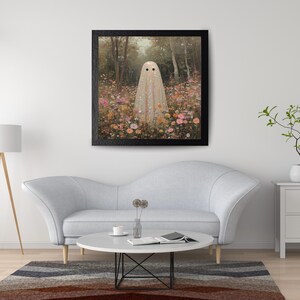 May include: Framed art print featuring a whimsical ghost figure in a field of colorful flowers. The ghost is draped in a shimmering, glittery fabric. The artwork is set against a backdrop of a forest with trees and a soft, dreamy atmosphere.