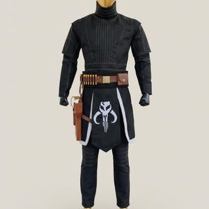 May include: Black costume with a high collar, featuring a white-edged apron with a skull emblem. Includes a brown belt with ammo and a holster. The mannequin has a gold head and feet.