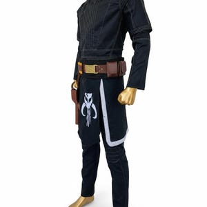 May include: Black costume with a high collar, long sleeves, and white stitching. The costume includes a belt with pouches, a holster, and a black skirt with a white and grey design. The costume is displayed on a mannequin.